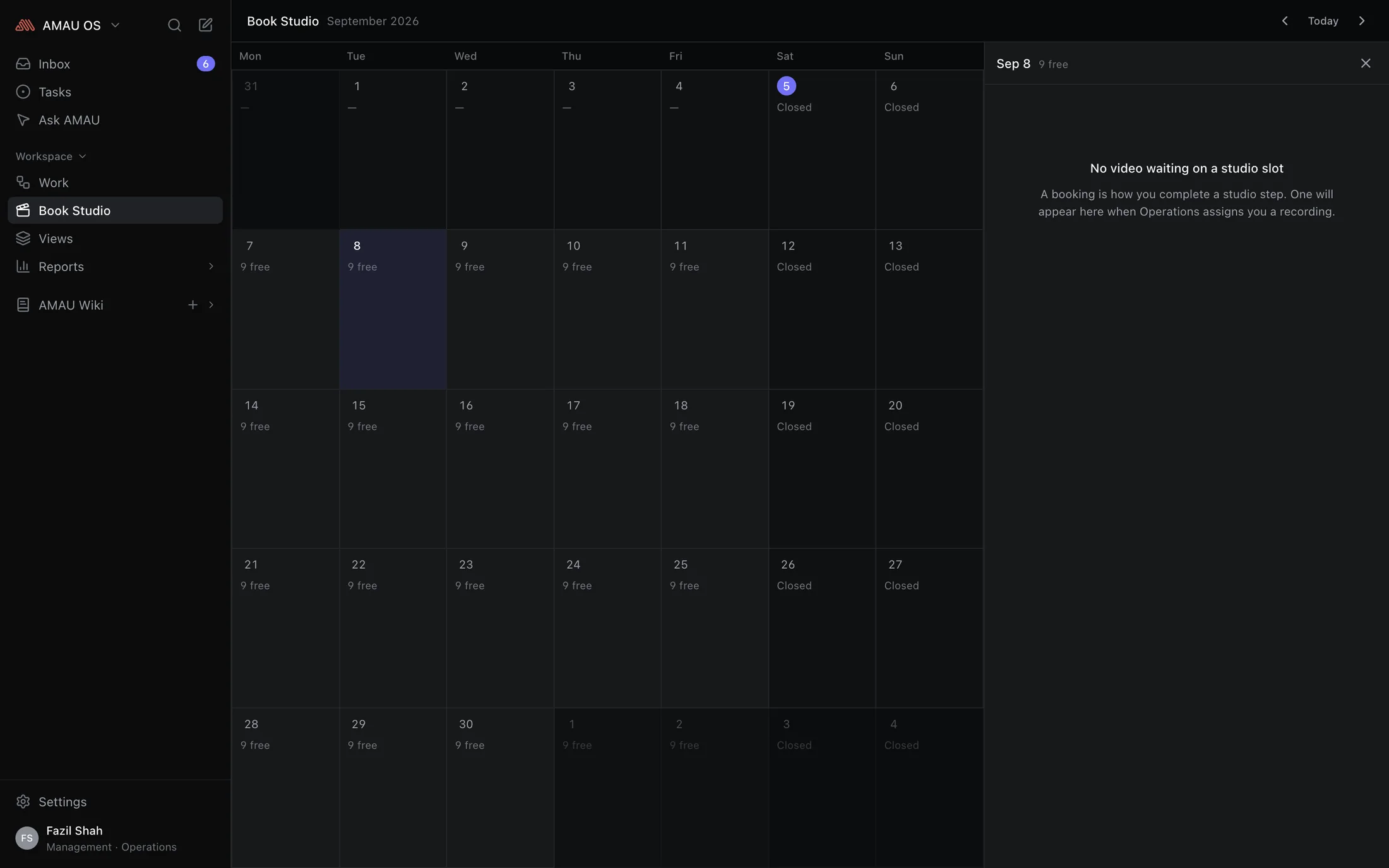 The studio calendar: a month of bookings with free slots, closures and who each slot belongs to.